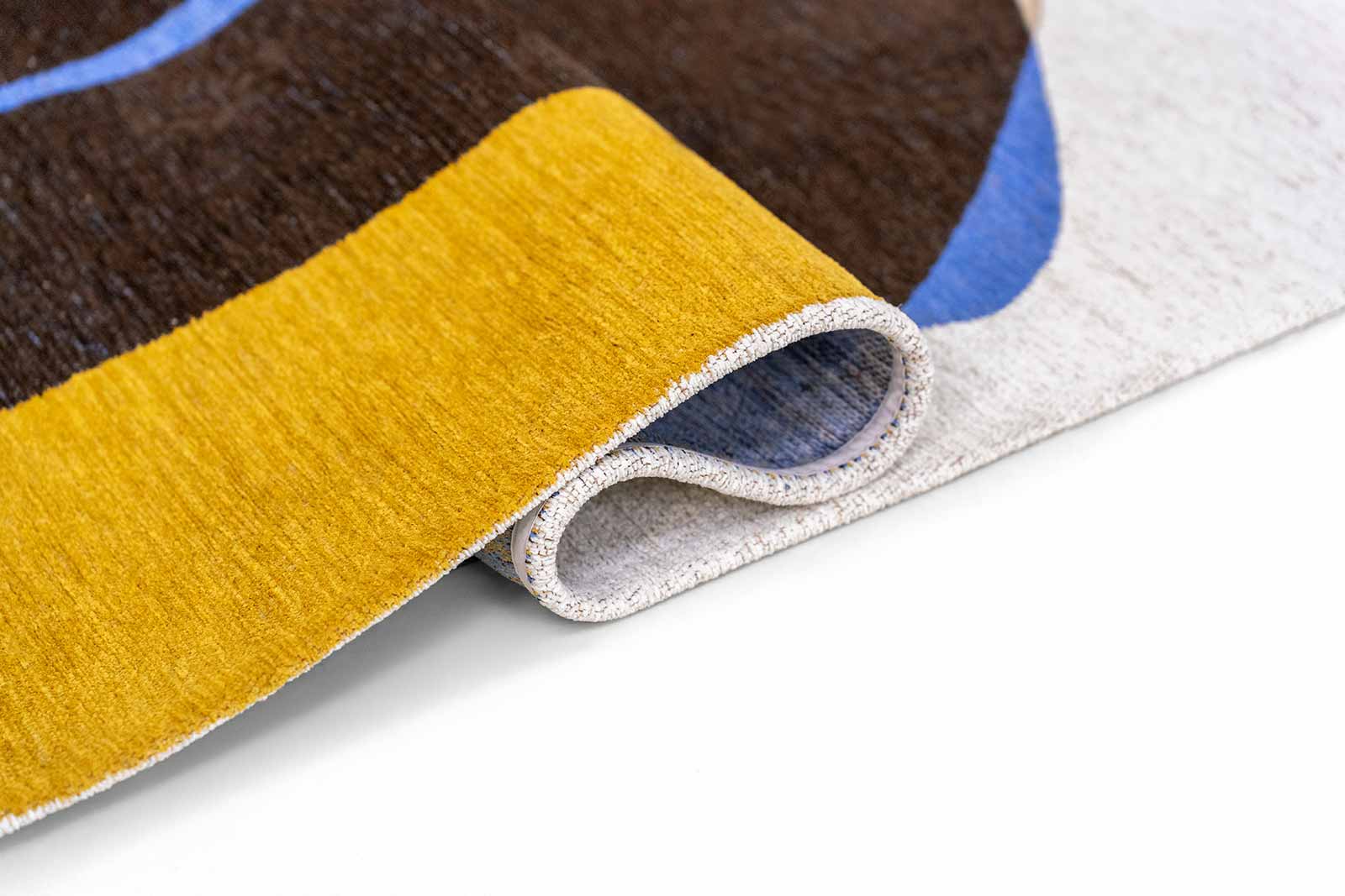 Louis De Poortere tapis Gallery 2085 Stones Sunny Blue fold