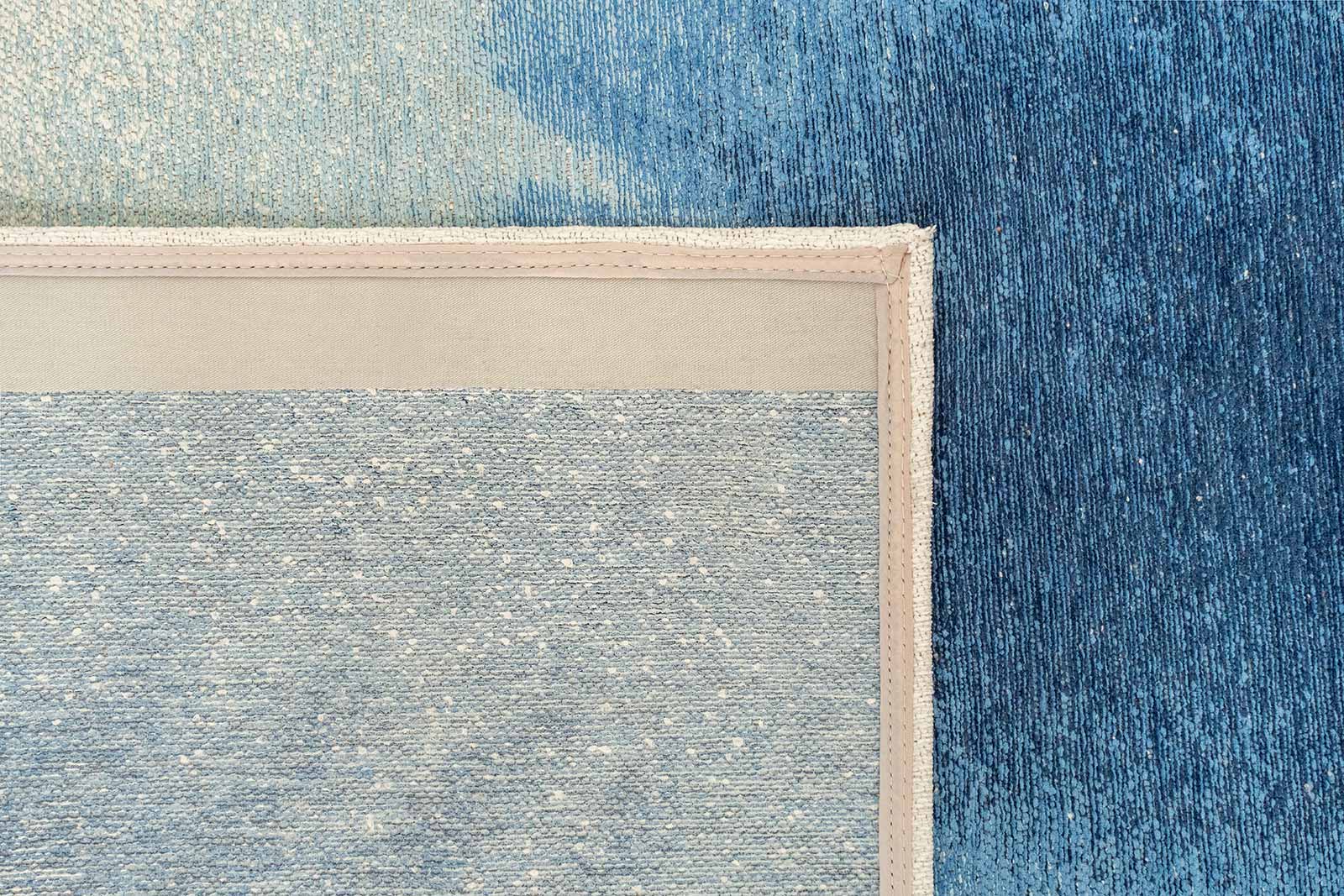 Louis De Poortere tapis Meditation 2102 Drop Dream In Blue back